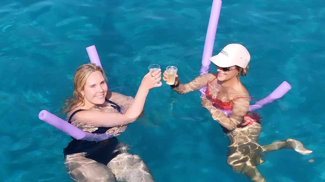 Swimming and drinking aperitif